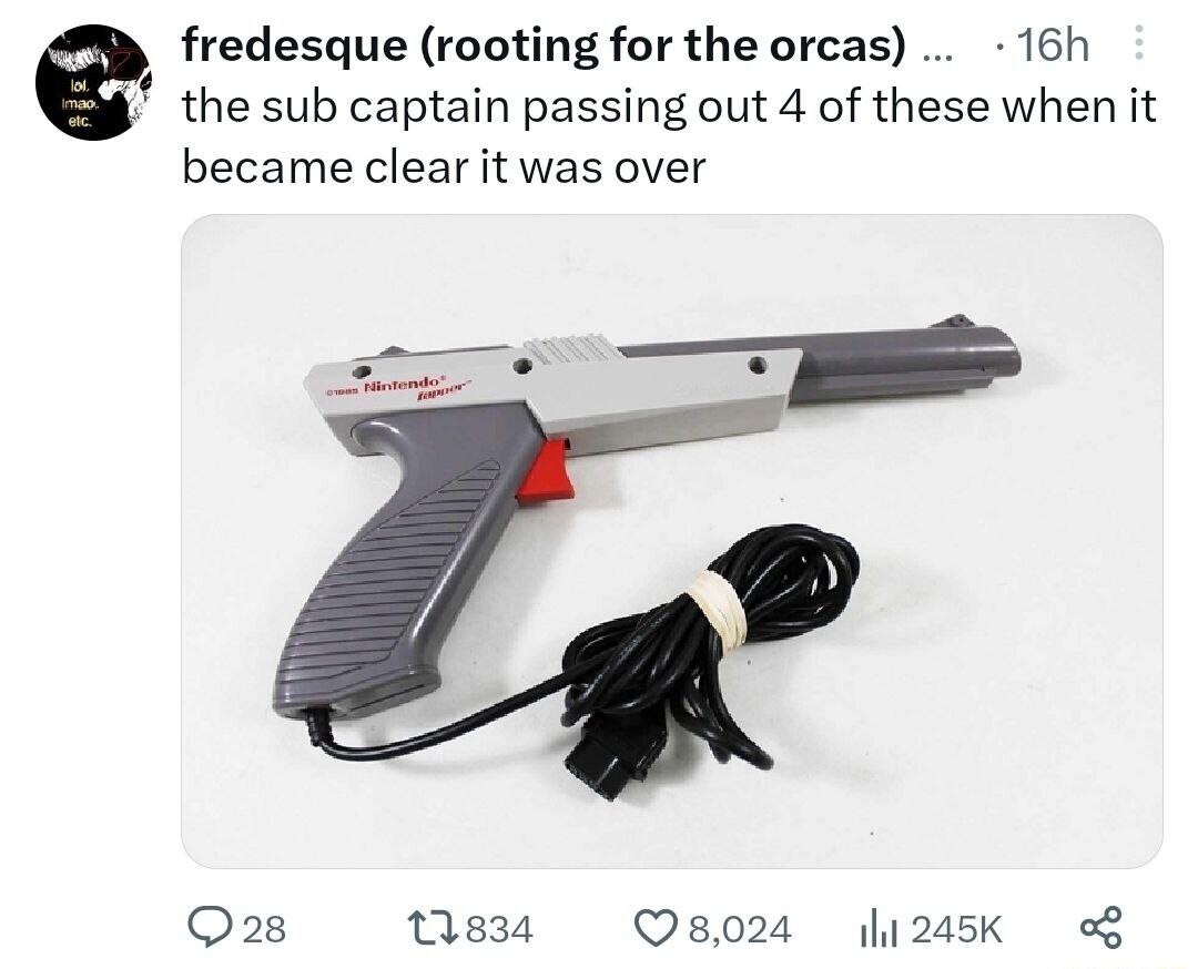 fredesque rooting for the orcas 16h the sub captain passing out 4 of these when it became clear it was over Q28 Wess Oso024 1245k o