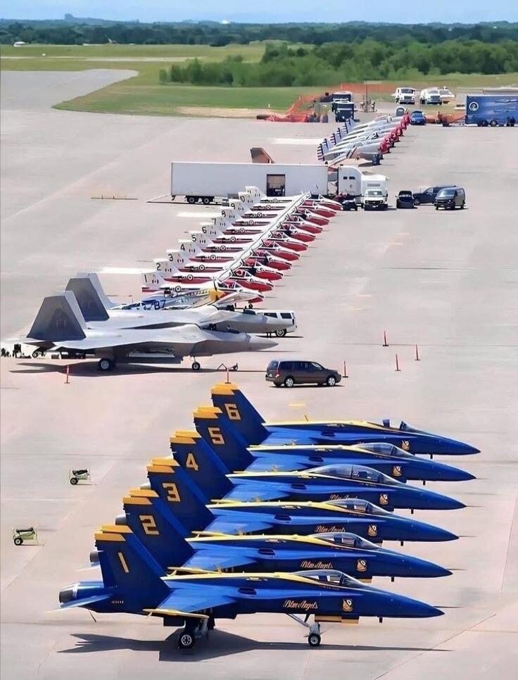 Blue Angels. Numbers 1, 2, 3, 4, 5, 6 are visible on the tails of the blue jets.