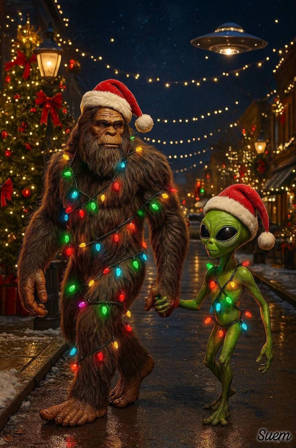 Bigfoot and an alien wearing Santa hats wrapped in colorful Christmas lights, holding hands and walking down a festively decorated street. Signature 'Suem' at the bottom.
