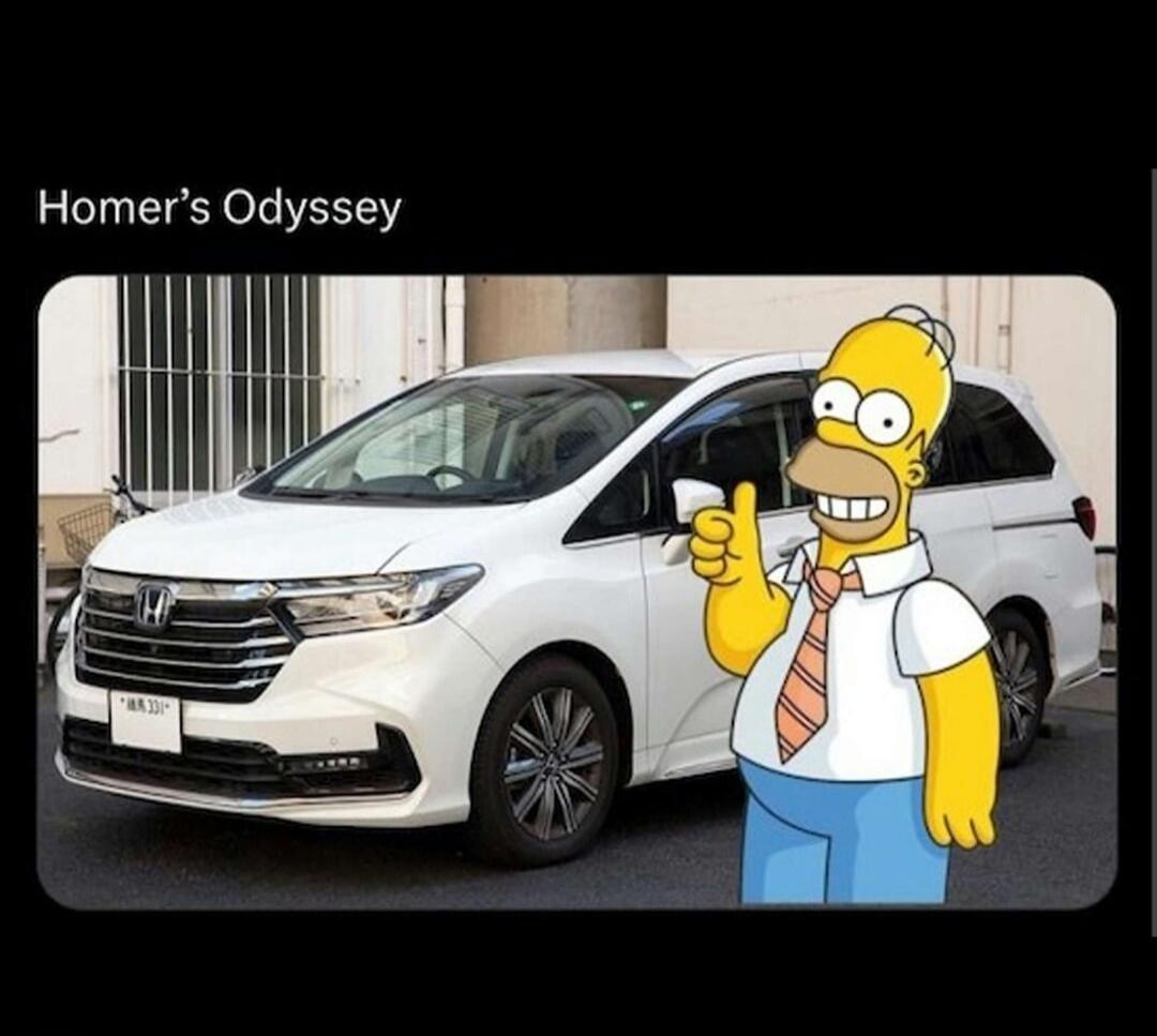 Homer Simpson stands next to a white Honda Odyssey minivan, giving a thumbs up. The text on the image reads 