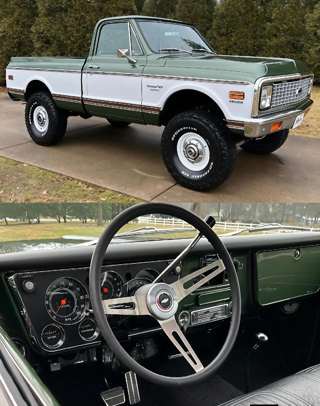 A vintage green and white Ford pickup with a classic interior featuring an aftermarket three-spoke steering wheel.