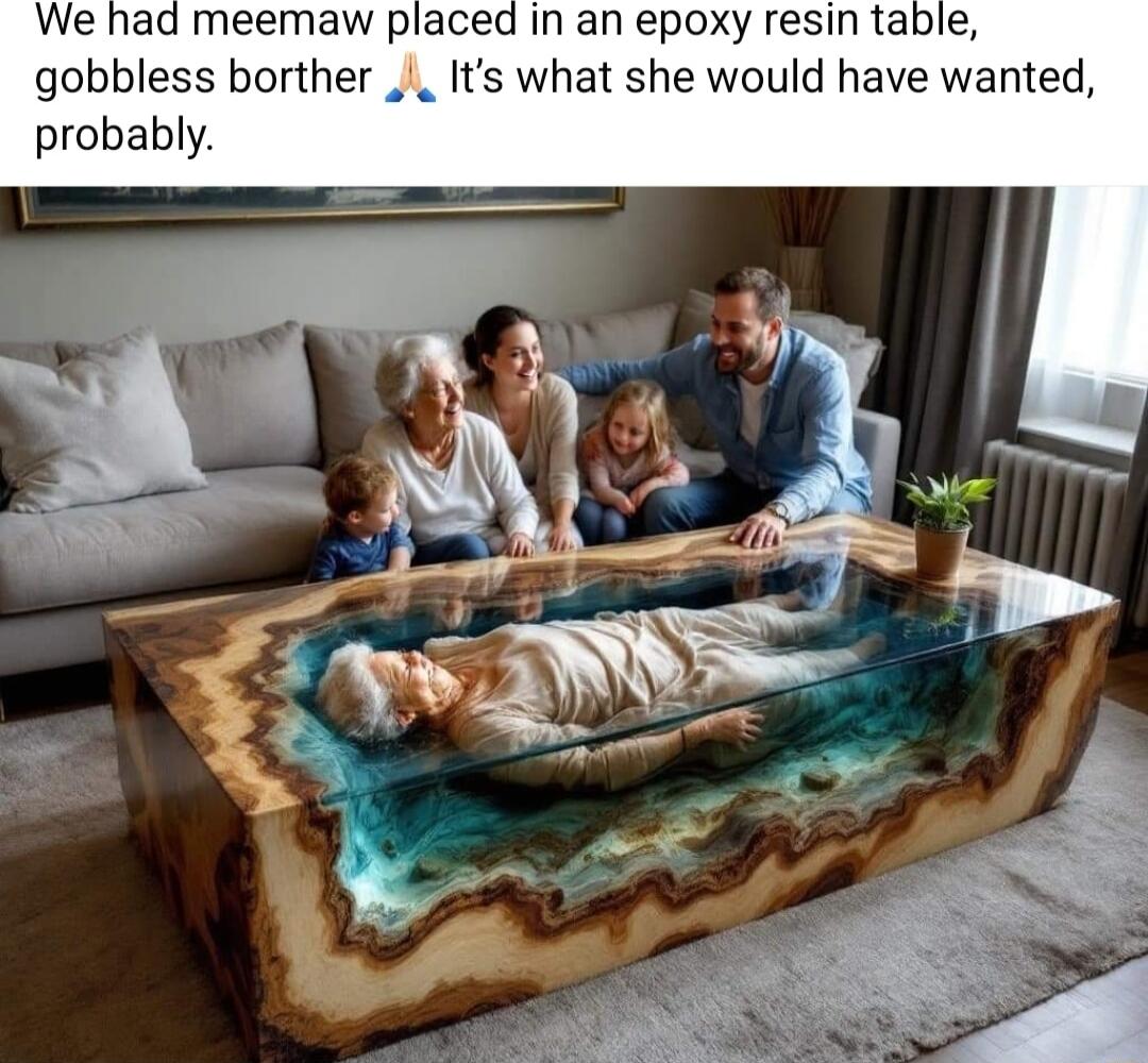 W placed in an epoxy resin table gobbless borther _ Its what she would have wanted probably