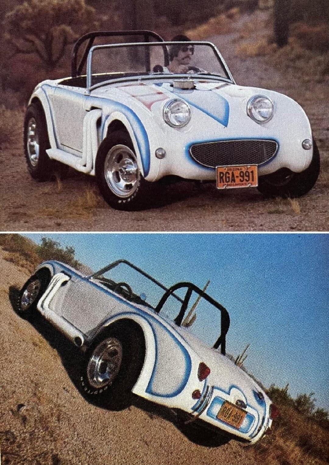 A custom white convertible car with blue and red accents, featuring large side exhaust pipes, driven by a man with a mustache in a desert setting. License plate: RGA-991, Arizona.