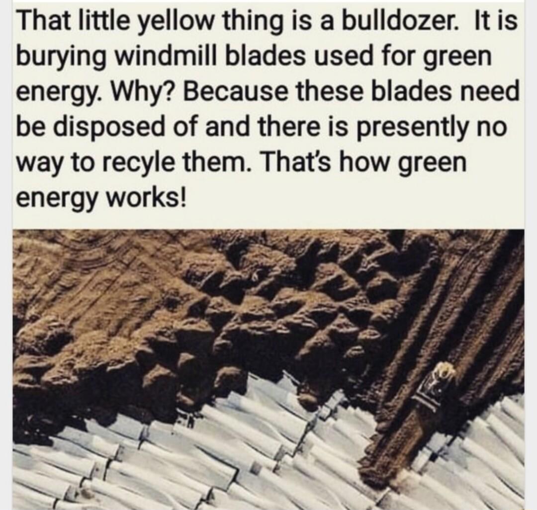 That little yellow thing is a bulldozer Itis burying windmill blades used for green energy Why Because these blades need be disposed of and there is presently no way to recyle them Thats how green energy works