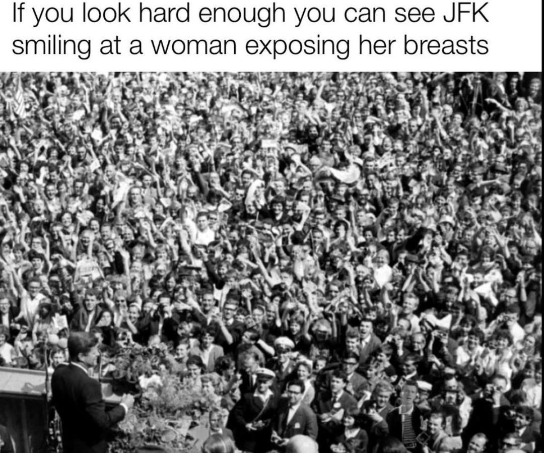 If you look hard enough you can see JFK smiling at a woman exposing her breasts