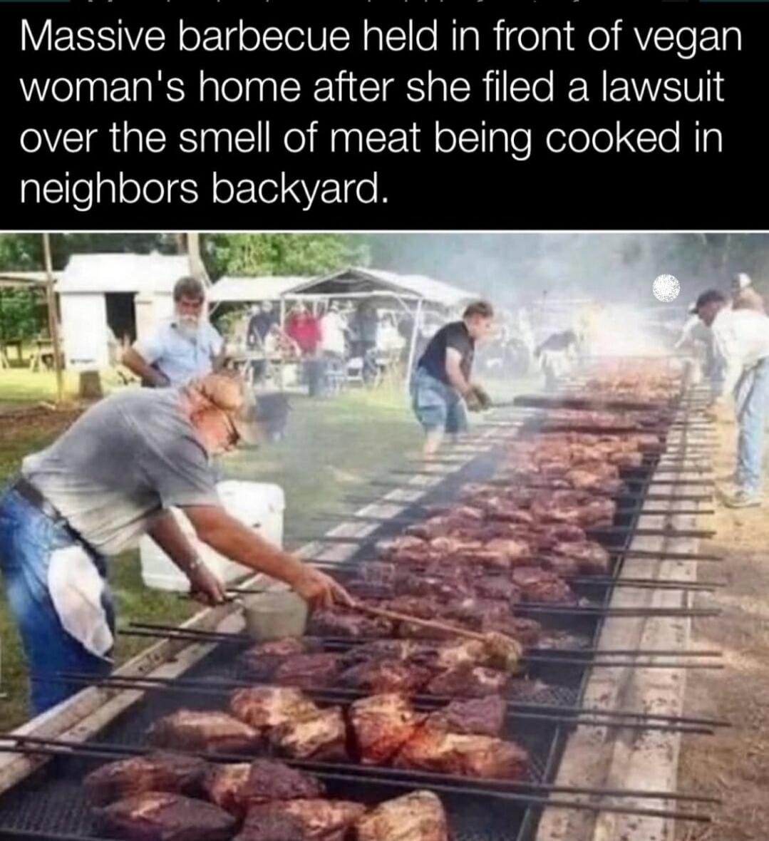 Massive barbecue held in front of vegan woman's home after she filed a lawsuit over the smell of meat being cooked in neighbors backyard.