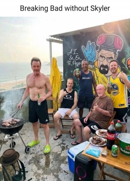 Breaking Bad without Skyler. A group of men, some resembling actors from the TV show Breaking Bad, are having a barbecue on a rooftop. One man is grilling, while others are sitting and holding drinks. There is a mural of Walter White in a hazmat suit on the wall, with text 