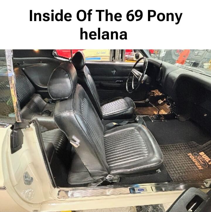 Inside Of The 69 Pony helana. The car's floor mat has 'Ford Built Tough' branding.