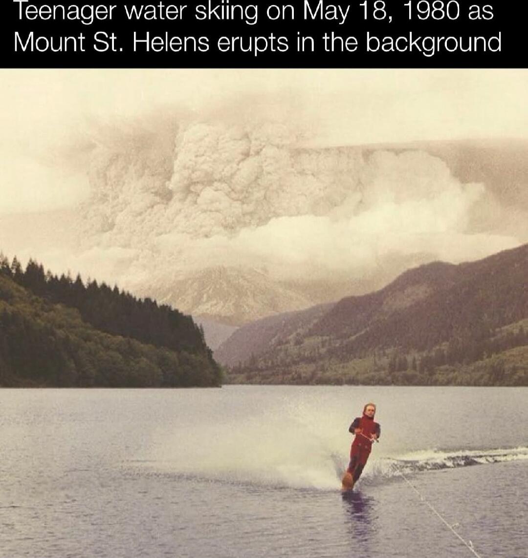 Teenager water skiing on May 18, 1980 as Mount St. Helens erupts in the background
