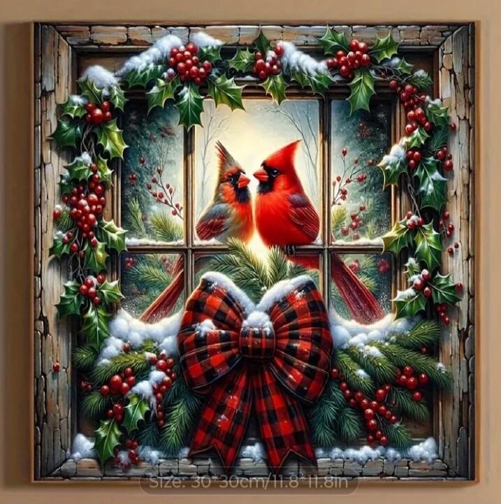 Two red cardinals perched on a snowy winter window framed by holly and pine, with a large red plaid bow at the bottom. Size: 30–30 cm / 11.8 × 11.8 in.