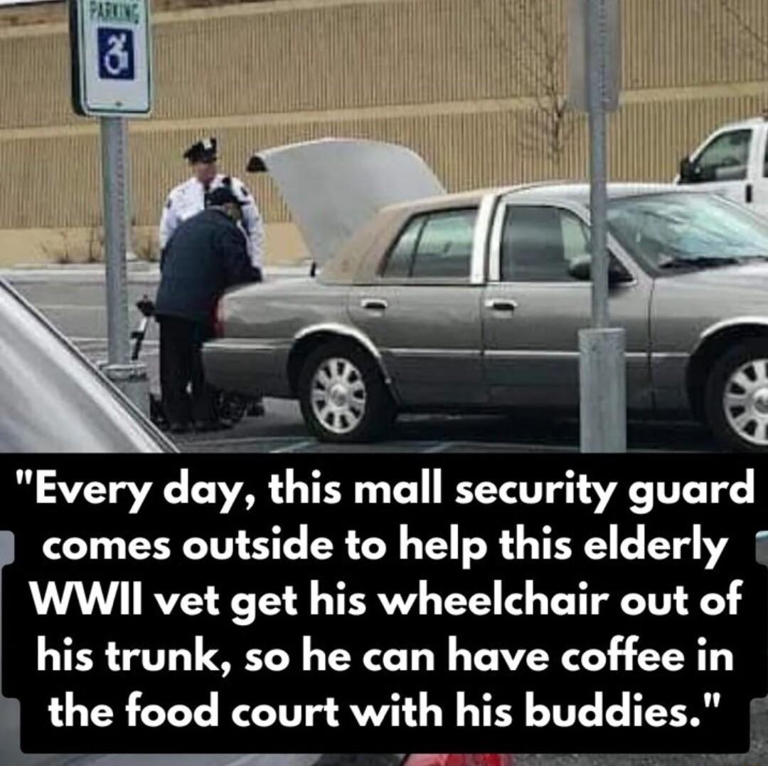 comes outside to help this elderly WWII vet get his wheelchair out of his trunk so he can have coffee in the food court with his buddies