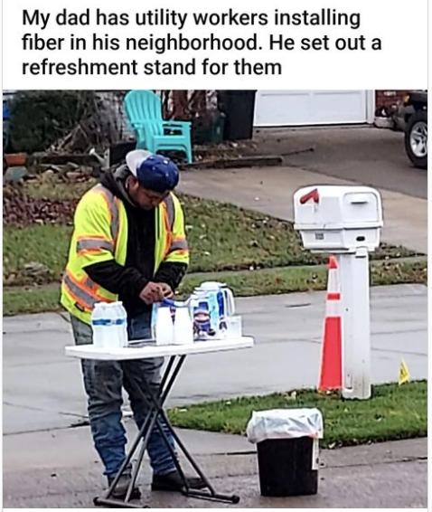 My dad has utility workers installing fiber in his neighborhood He set out a refreshment stand for them T