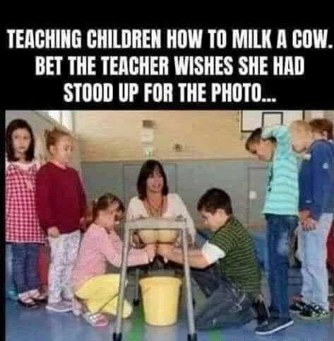 TEACHING CHILDREN HOW TO MILK R COW BET THE TEACHER WISHES SHE HAD ST00D UP FOR THE PHOTO