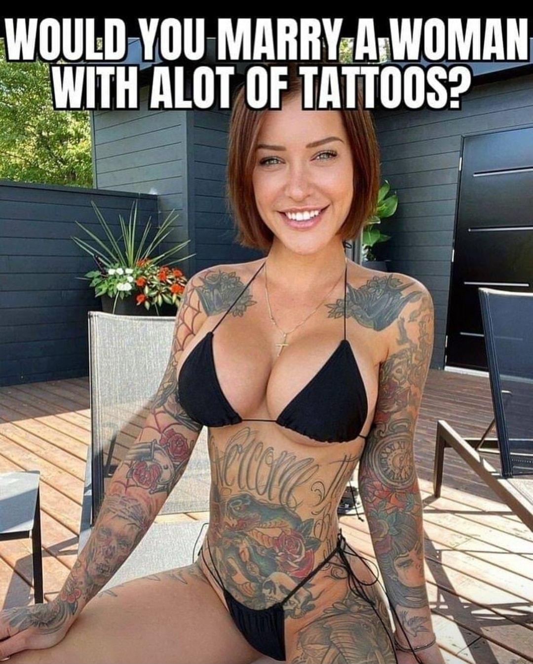 WOULDYOU MARRY AWOMAN W 9 e ALOT OF TATTO0S i