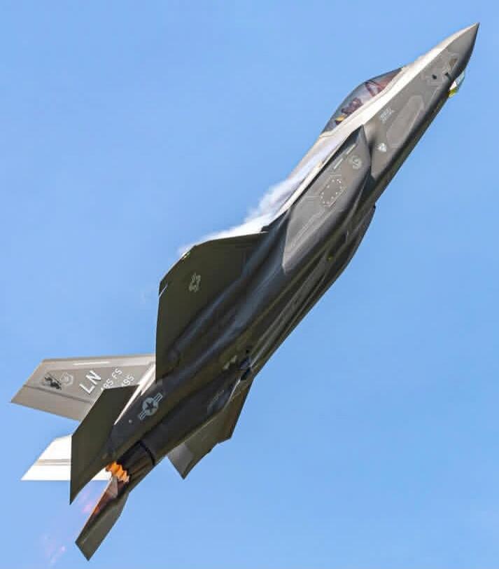 F-35 fighter jet performing a maneuver.