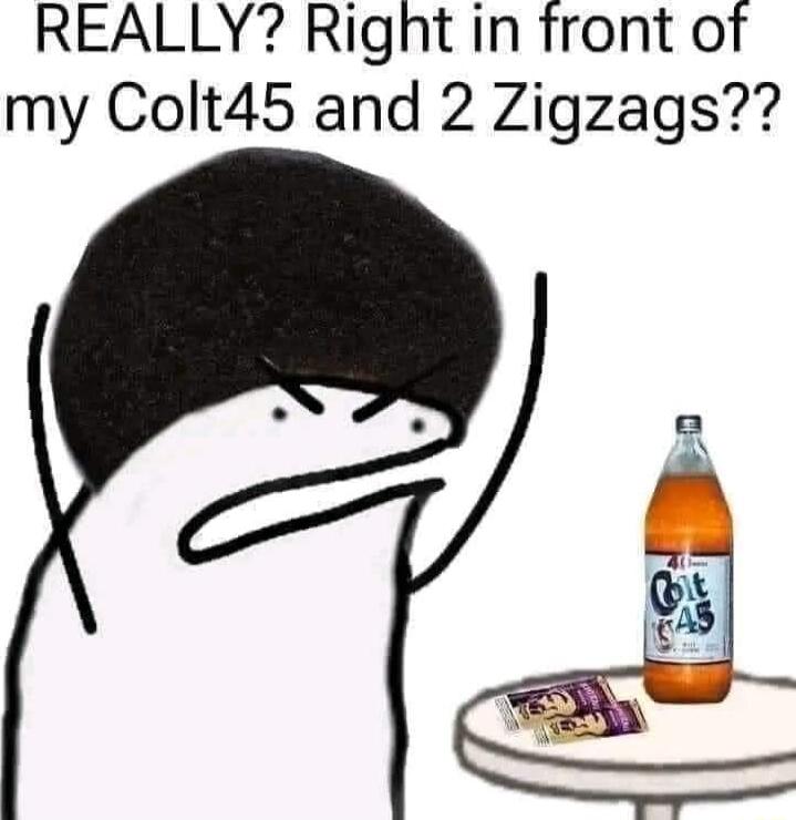 REALLY Rignht in front of my Colt45 and 2 Zigzags