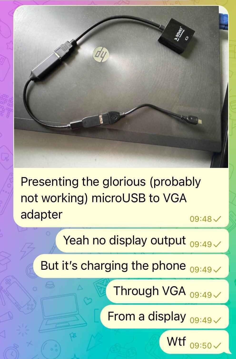 Presenting the glorious probably not working microUSB to VGA adapter 0948v Yeah no display output 5 But its charging the phone 45 Through VGA 45 From a display 545 wif 0950v