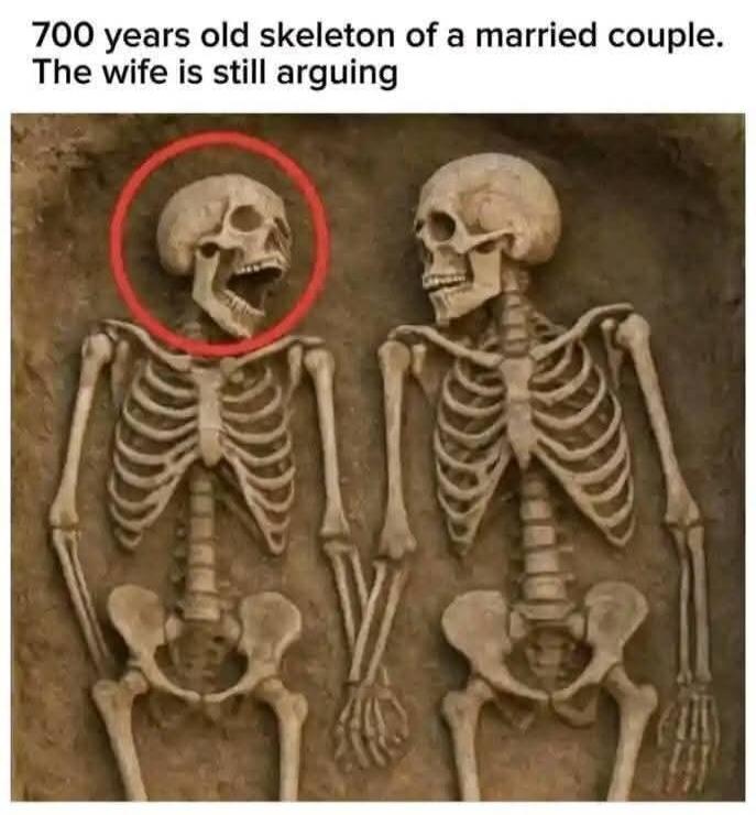 700 years old skeleton of a married couple. The wife is still arguing