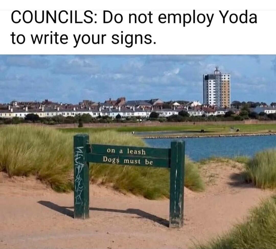COUNCILS: Do not employ Yoda to write your signs. on a leash Dogs must be