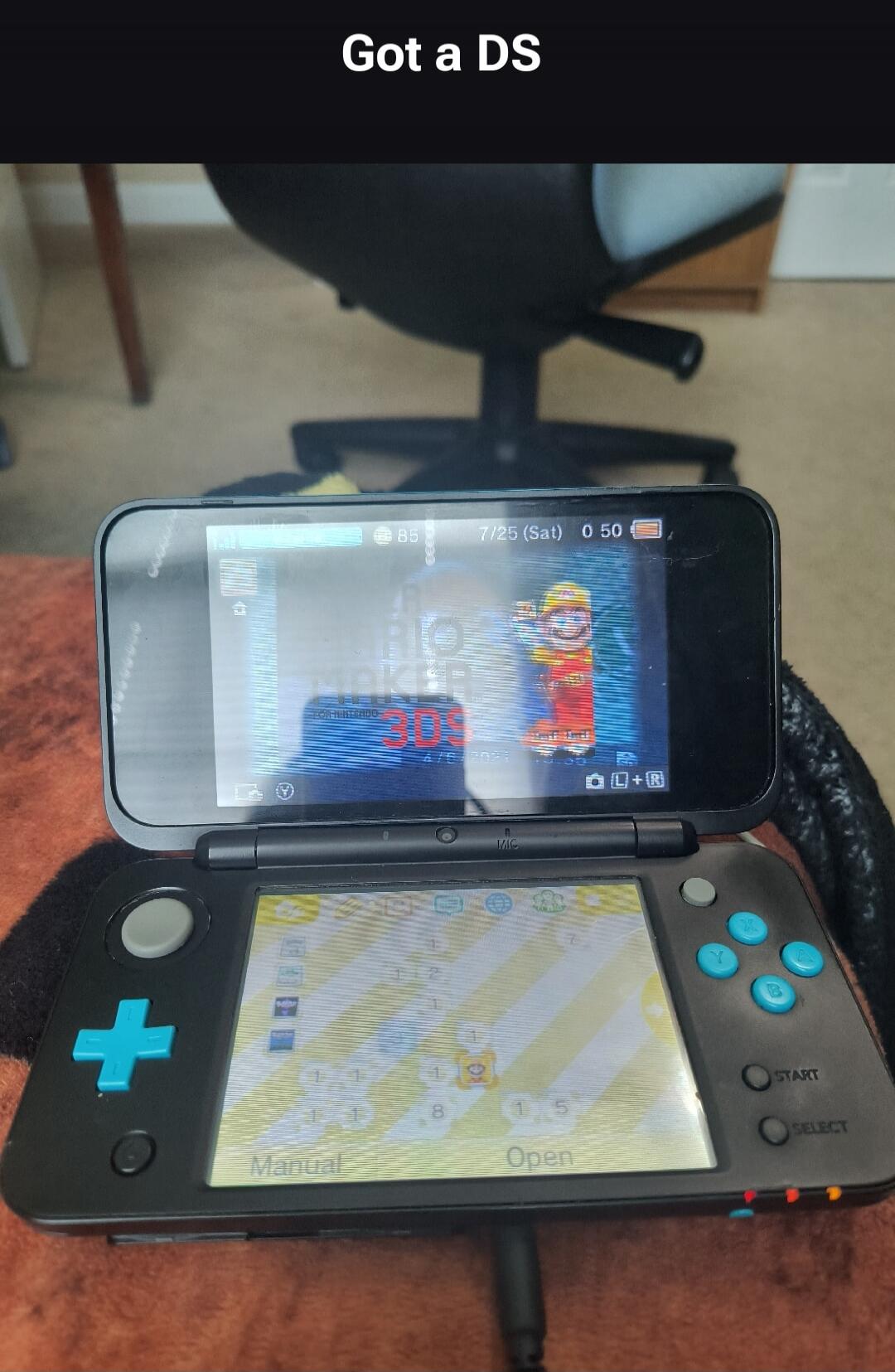 Got a DS. On the top screen, a game featuring Mario is visible, along with text 'FOR NINTENDO 3DS', '7/25 (Sat) 0:50', and '4/6/2023 15:33'. The bottom screen shows the console's menu with 'Manual' and 'Open' options.