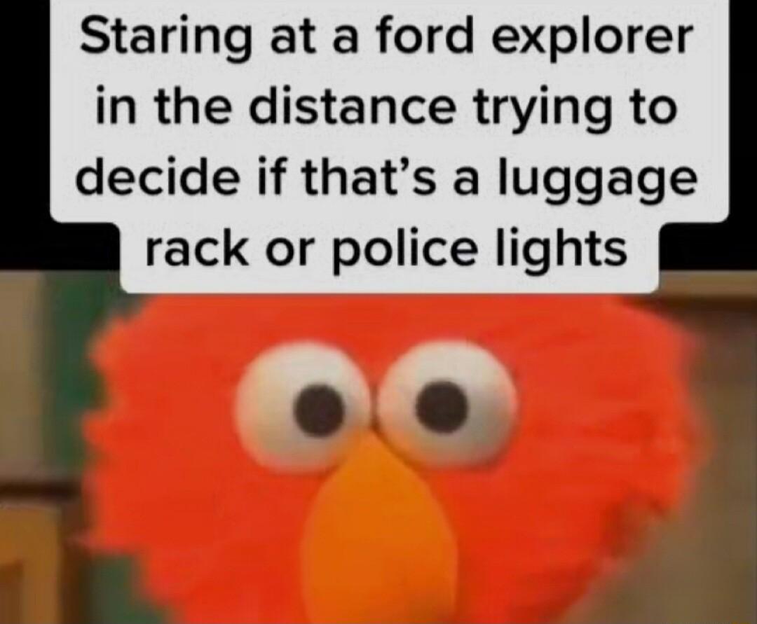 Staring at a ford explorer in the distance trying to decide if thats a luggage rack or police lights