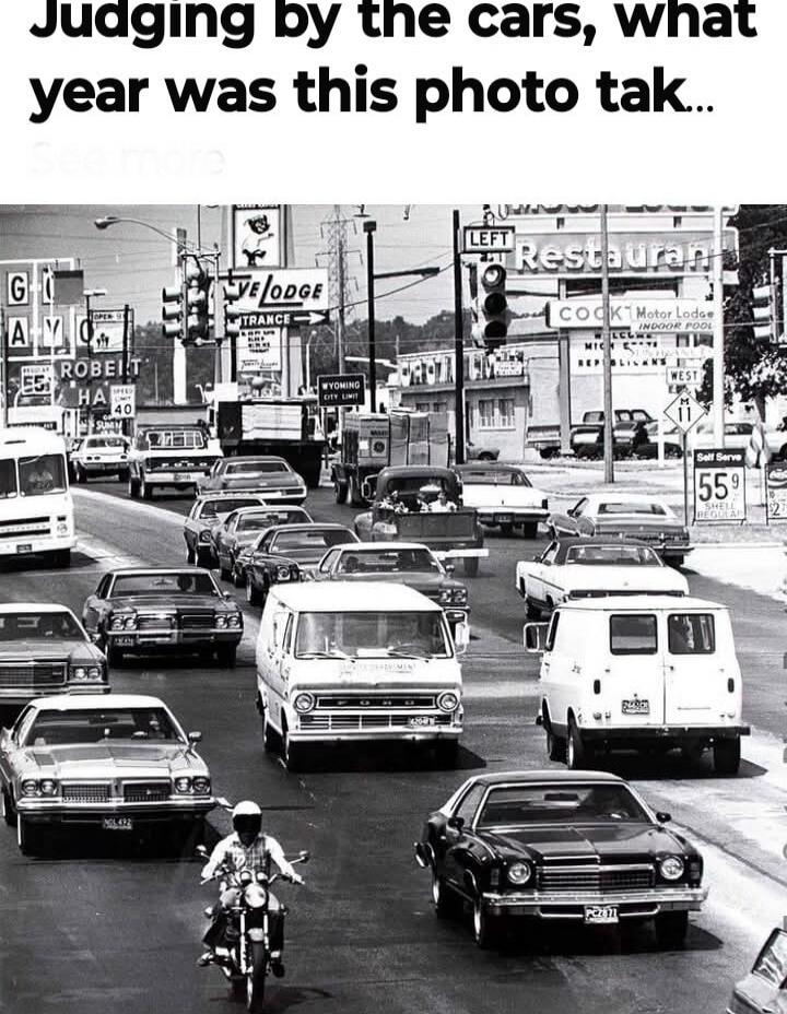Judging by the cars, what year was this photo tak...