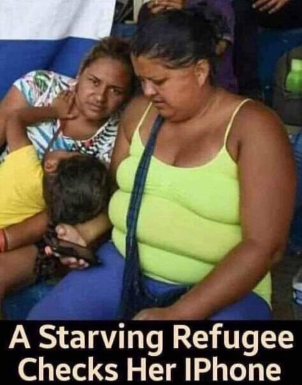 A Starving Refugee Checks Her IPhone