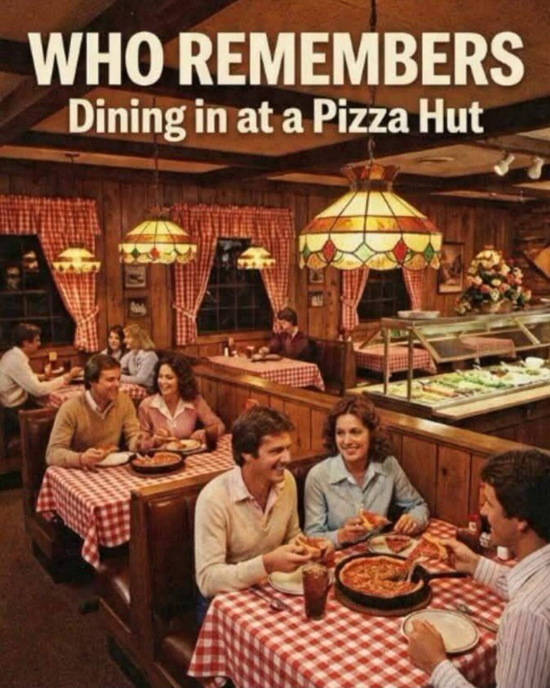 WHO REMEMBERS Dining in at a Pizza Hut. A vintage scene inside a Pizza Hut restaurant with several groups of people dining at tables with red and white checkered tablecloths, enjoying pizza and drinks under stained-glass lamps.