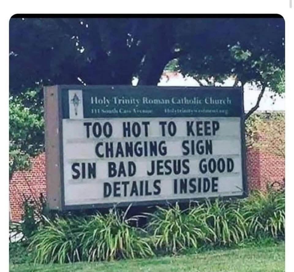 Holy Trinity Roman Catholic Church. TOO HOT TO KEEP CHANGING SIGN. SIN BAD JESUS GOOD. DETAILS INSIDE.
