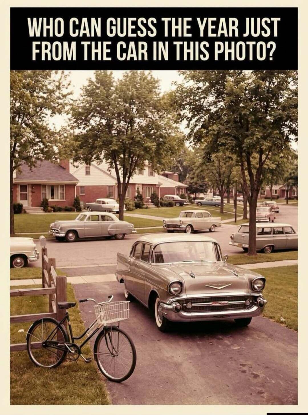 WHO CAN GUESS THE YEAR JUST FROM THE CAR IN THIS PHOTO?