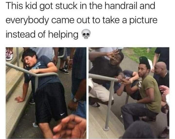 This kid got stuck in the handrail and everybody came out to take a picture instead of helping s