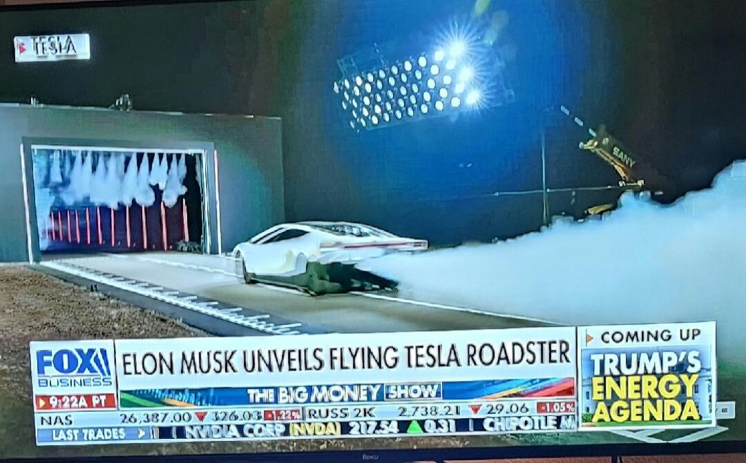 The image displays a television screen showing a FOX Business news broadcast. The main headline prominently states: 