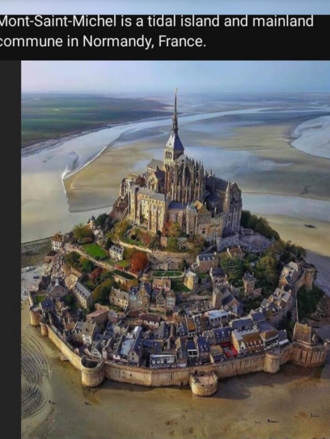 Mont-Saint-Michel is a tidal island and mainland commune in Normandy, France.