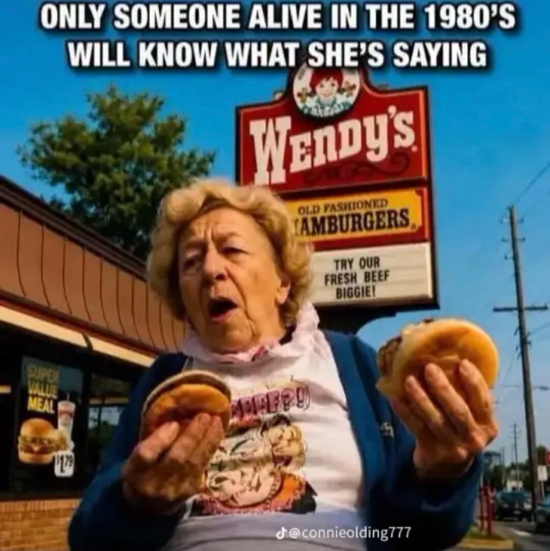 ONLY SOMEONE ALIVE IN THE 1980'S WILL KNOW WHAT SHE'S SAYING. Wendy's. OLD FASHIONED HAMBURGERS. TRY OUR FRESH BEEF BIGGIE! SUPER VALUE MEAL $1.79. (Implied: Where's the beef?)