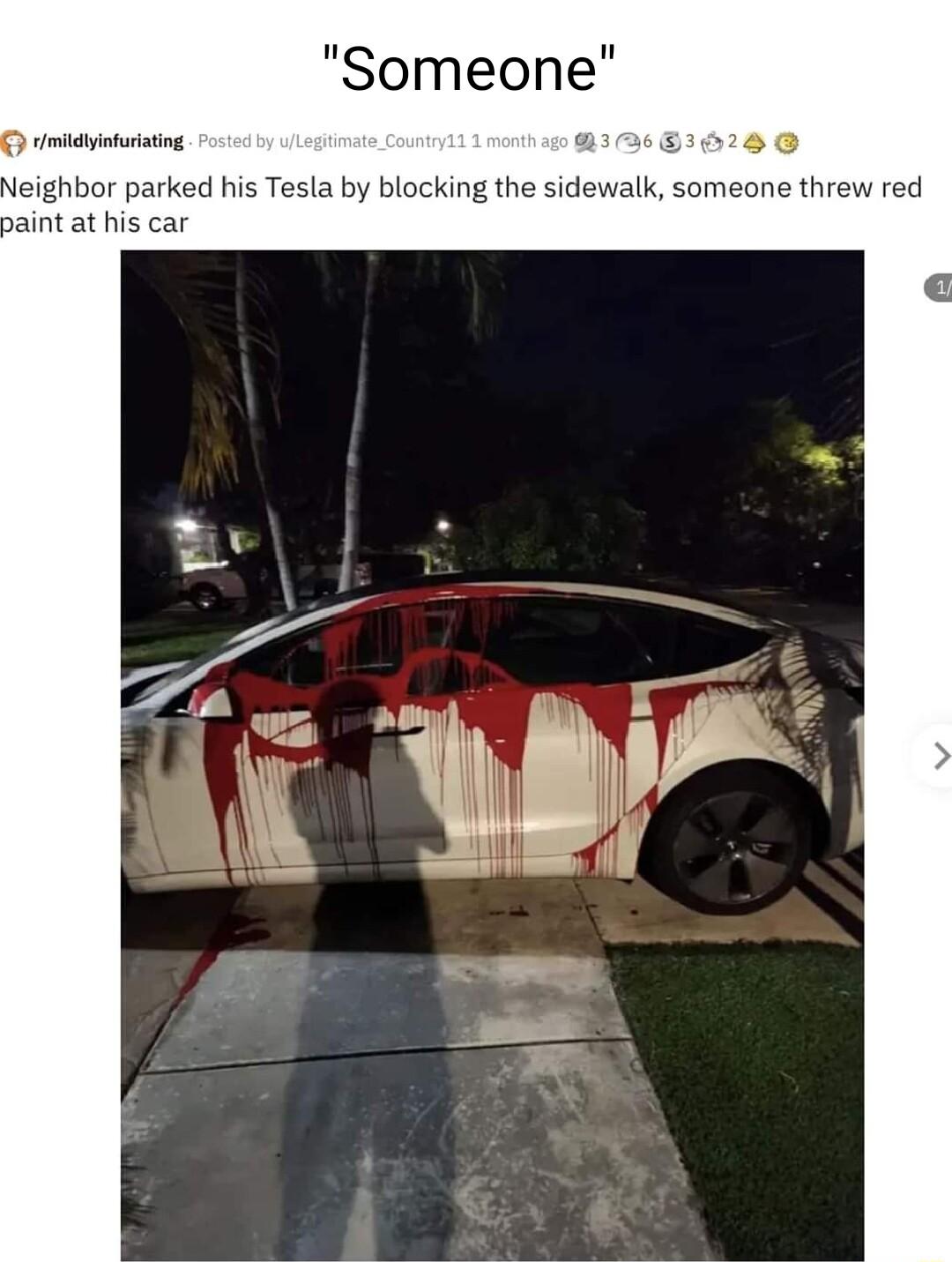 Someone midinurising Neighbor parked his Tesla by blocking the sidewalk someone threw red aint at his car