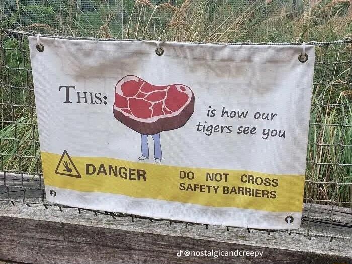 is how oup tigers see 4oy D0 NOT cross SAFETY BARRIERS