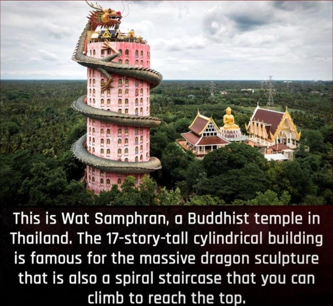 o This is Wat Samphran a Buddhist temple in Thailand The 17 story tall cylindrical building is famous for the massive dragon sculpture that is also a spiral staircase that you can climb to reach the top