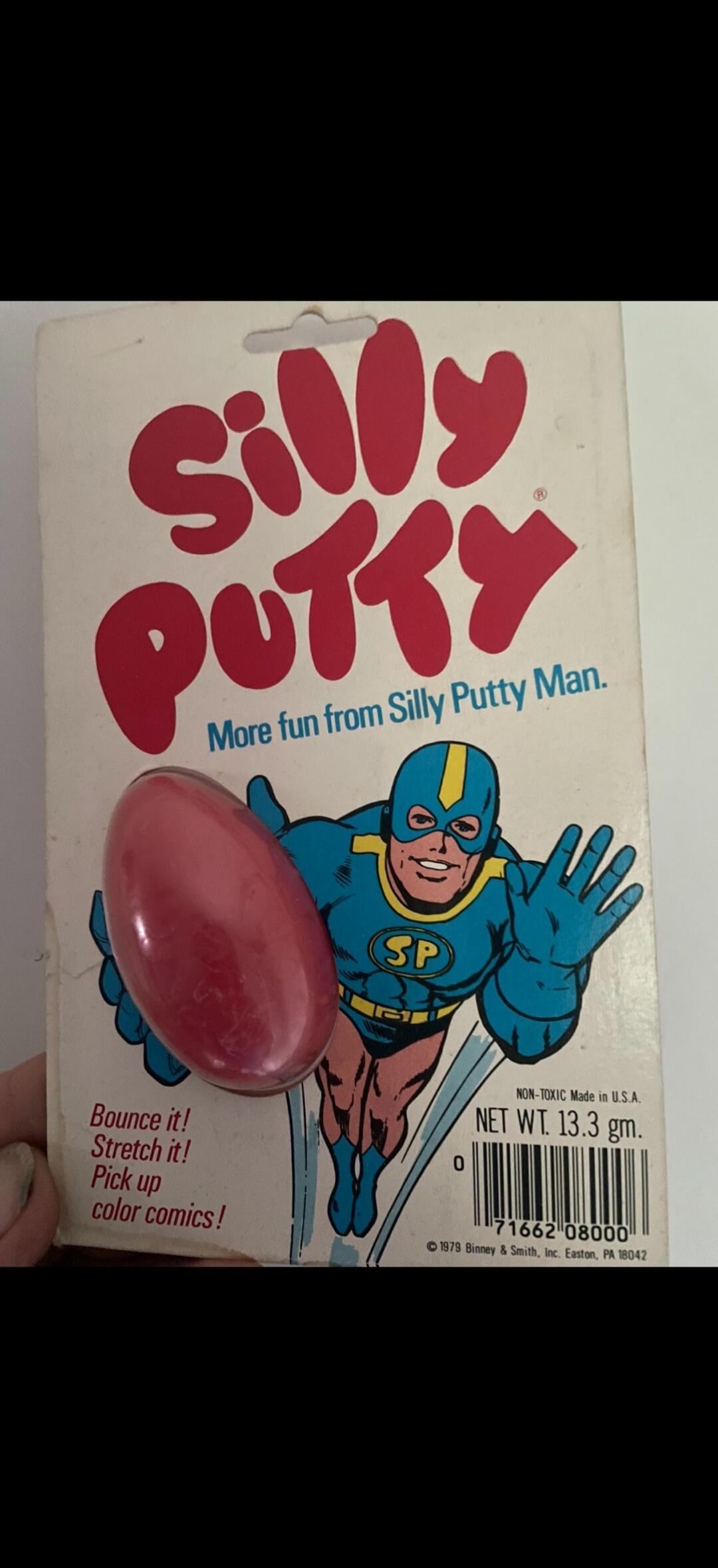 SILLY PUTTY More fun from Silly Putty Man. Bounce it! Stretch it! Pick up color comics! NON-TOXIC Made in U.S.A. NET WT. 13.3 gm. 71662 08000 © 1979 Binney & Smith, Inc. Easton, PA 18042