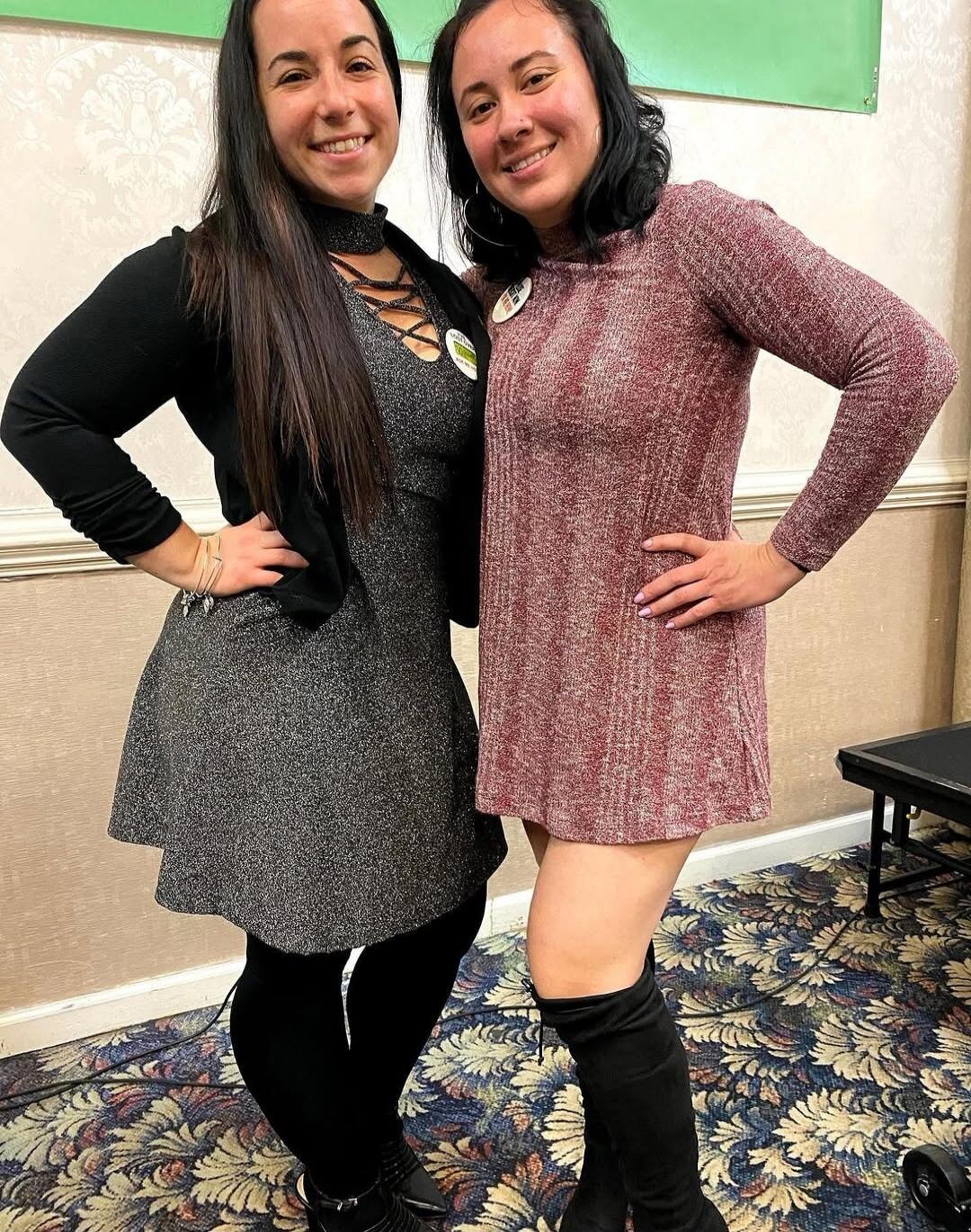 Two women smiling and posing for a photo.