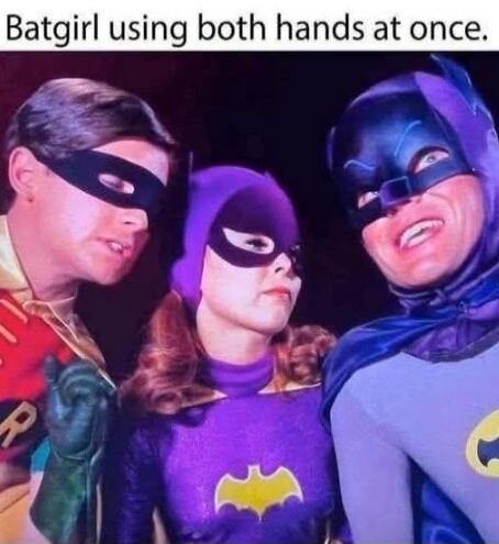 Batgirl using both hands at once.