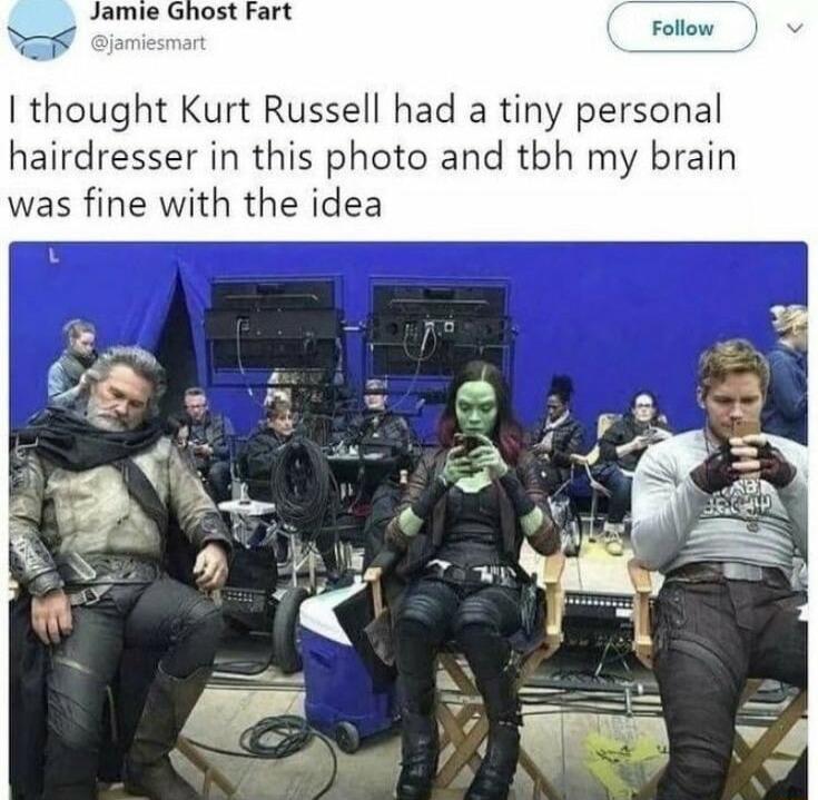 thought Kurt Russell had a tiny personal hairdresser in this photo and tbh my brain was fine with the idea