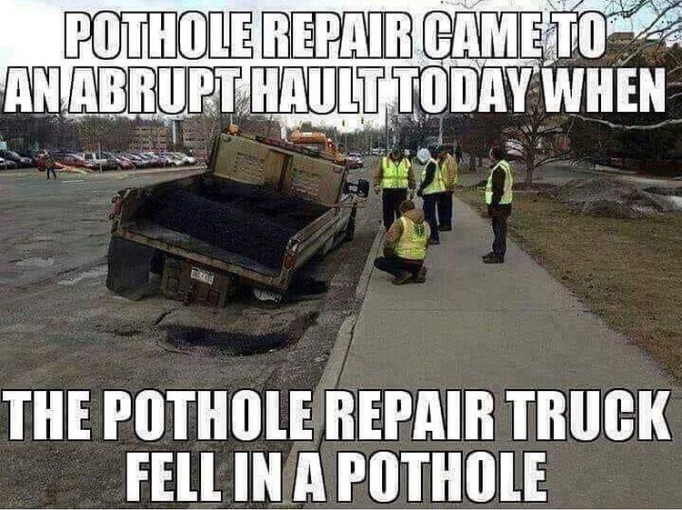 THE POTHOLE REPRIR TRUCK FELLINAPOTHOLE