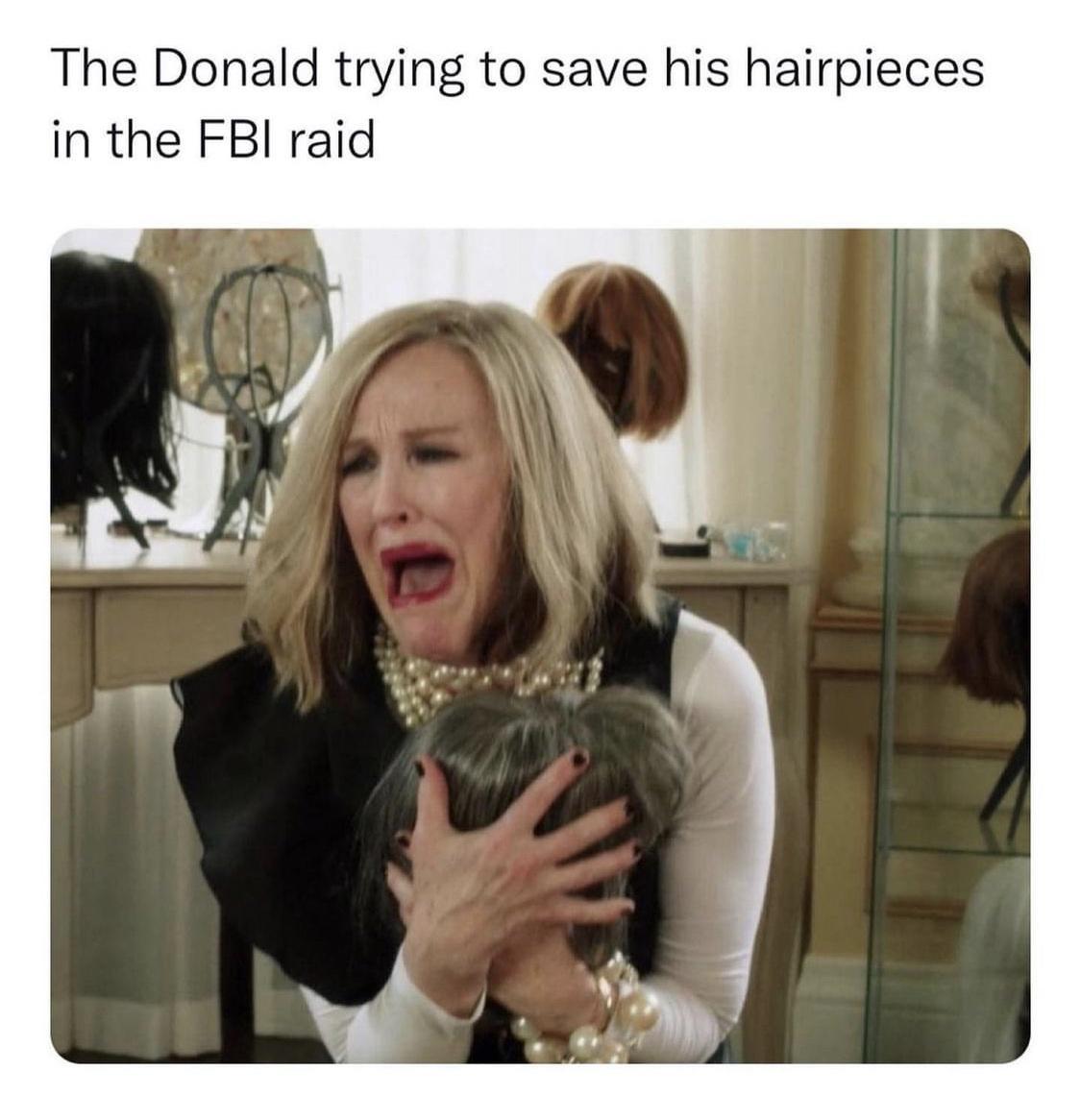 The Donald trying to save his hairpieces in the FBI raid