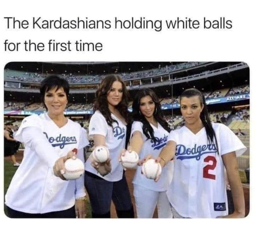 The Kardashians holding white balls for the first time