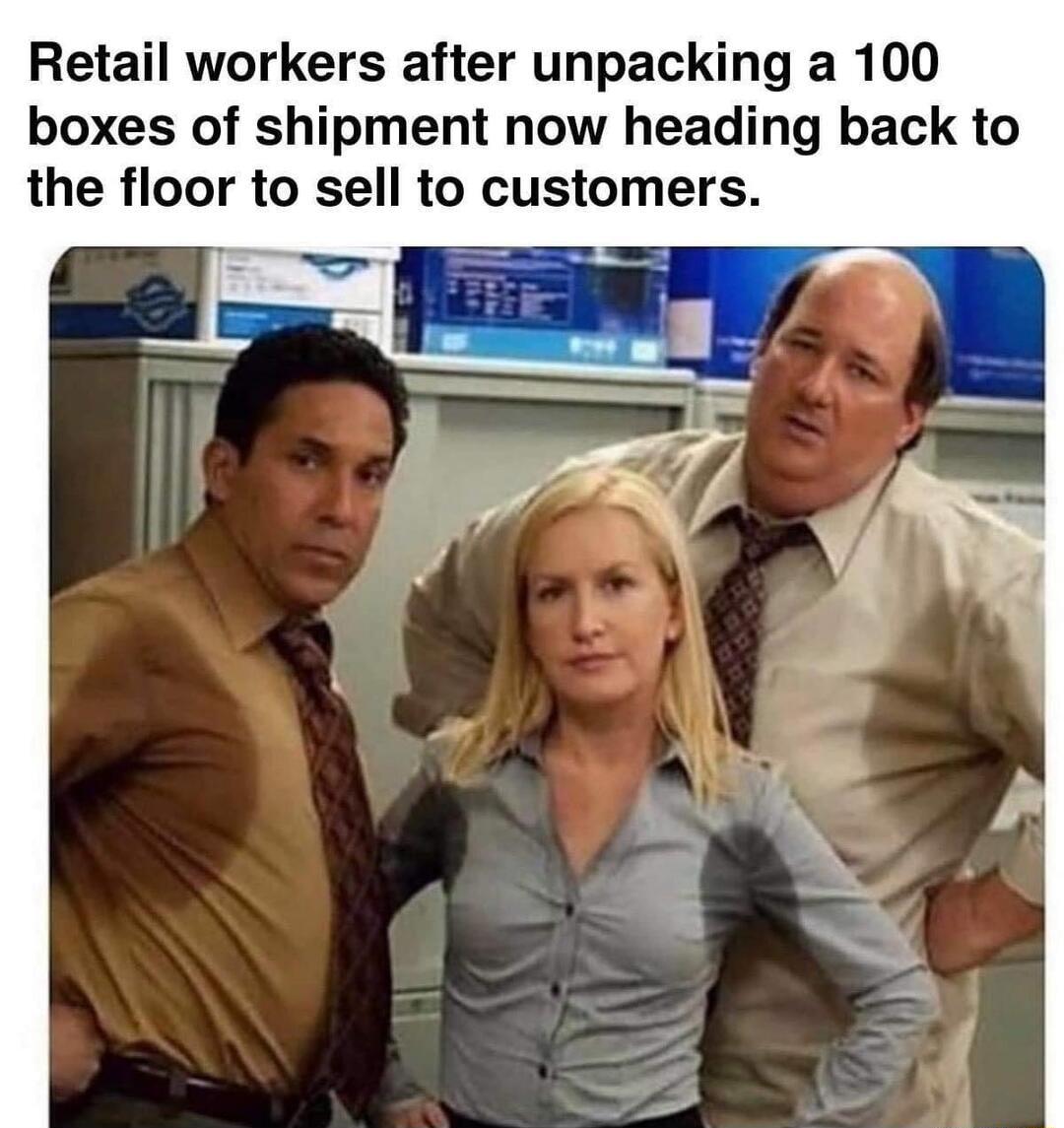 Retail workers after unpacking a 100 boxes of shipment now heading back to the floor to sell to customers