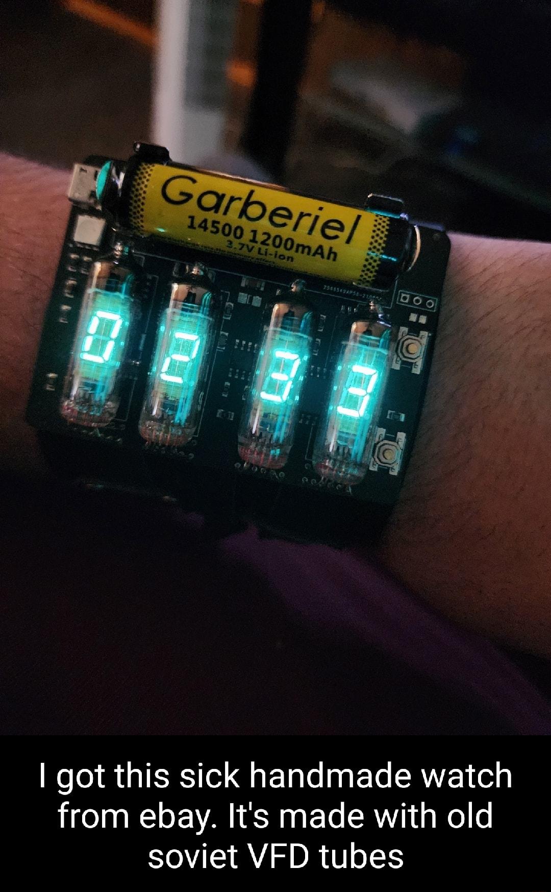 got this sick handmade watch from ebay Its made with old soviet VFD tubes