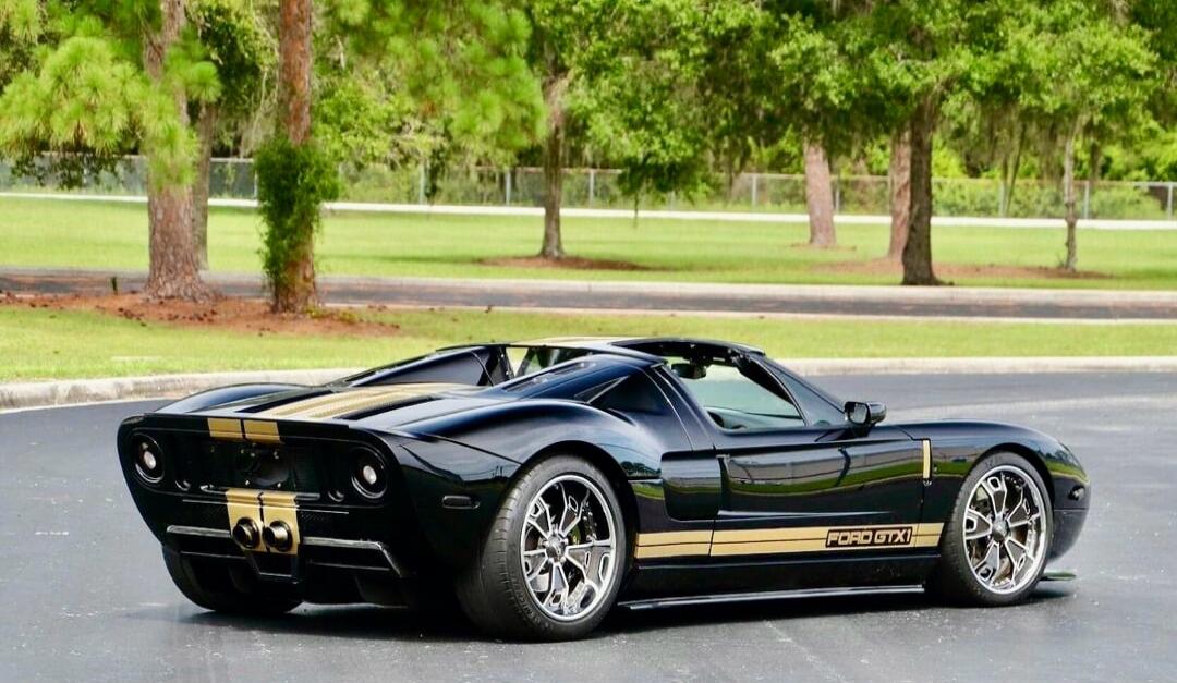 Ford GT with gold racing stripes