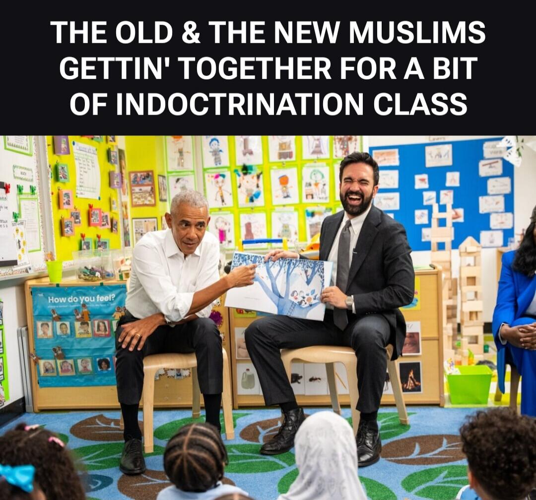 THE OLD & THE NEW MUSLIMS GETTIN' TOGETHER FOR A BIT OF INDOCTRINATION CLASS. Barack Obama and another man are reading a children's book to a group of young children in what appears to be a classroom setting.