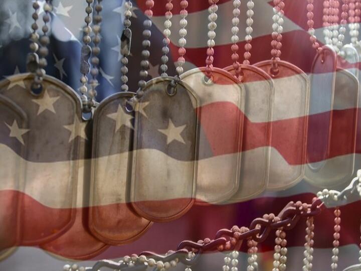 American flag with military dog tags