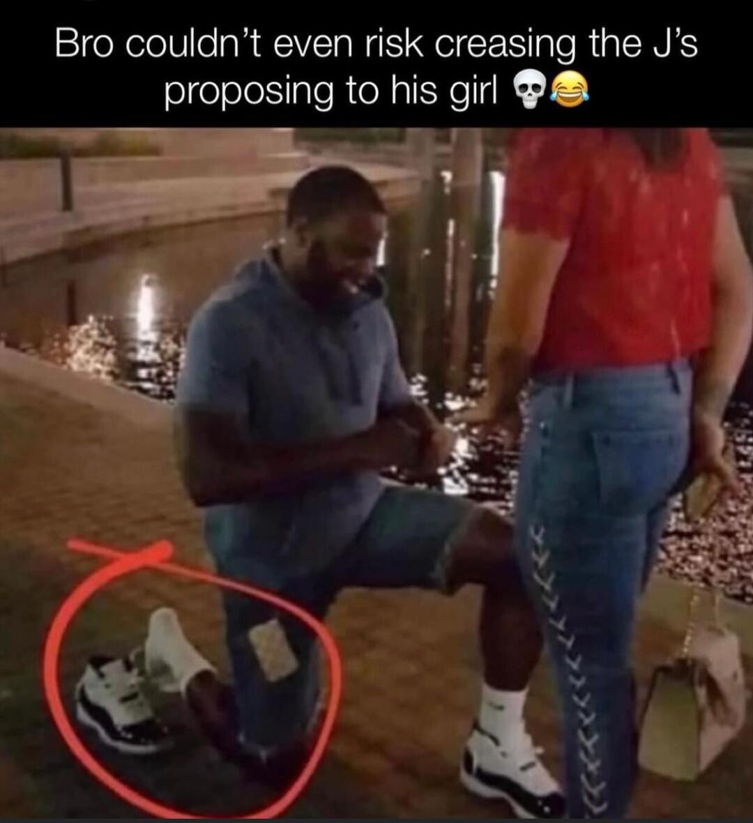 Bro couldnt even risk creasing the Js proposing to his girl